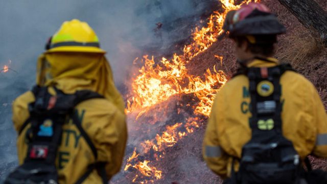 California Firefighters Gain Ground with Calmer Winds as Death Toll Climbs to 24