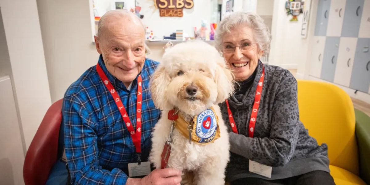 Long Island Retirees, Along with Their Dog, Dedicate Time to Serving Nassau Children