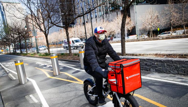 DoorDash will pay delivery drivers in New York $17 million because they used tips to pay their wages